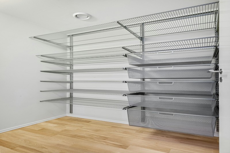 Affordable wire shelving system installed in a small closet