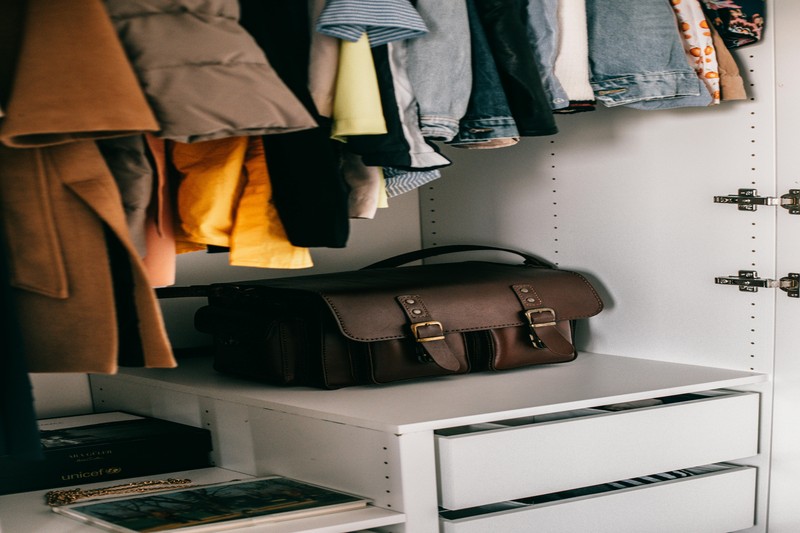 Cedar hanging bags hanging in a walk-in closet